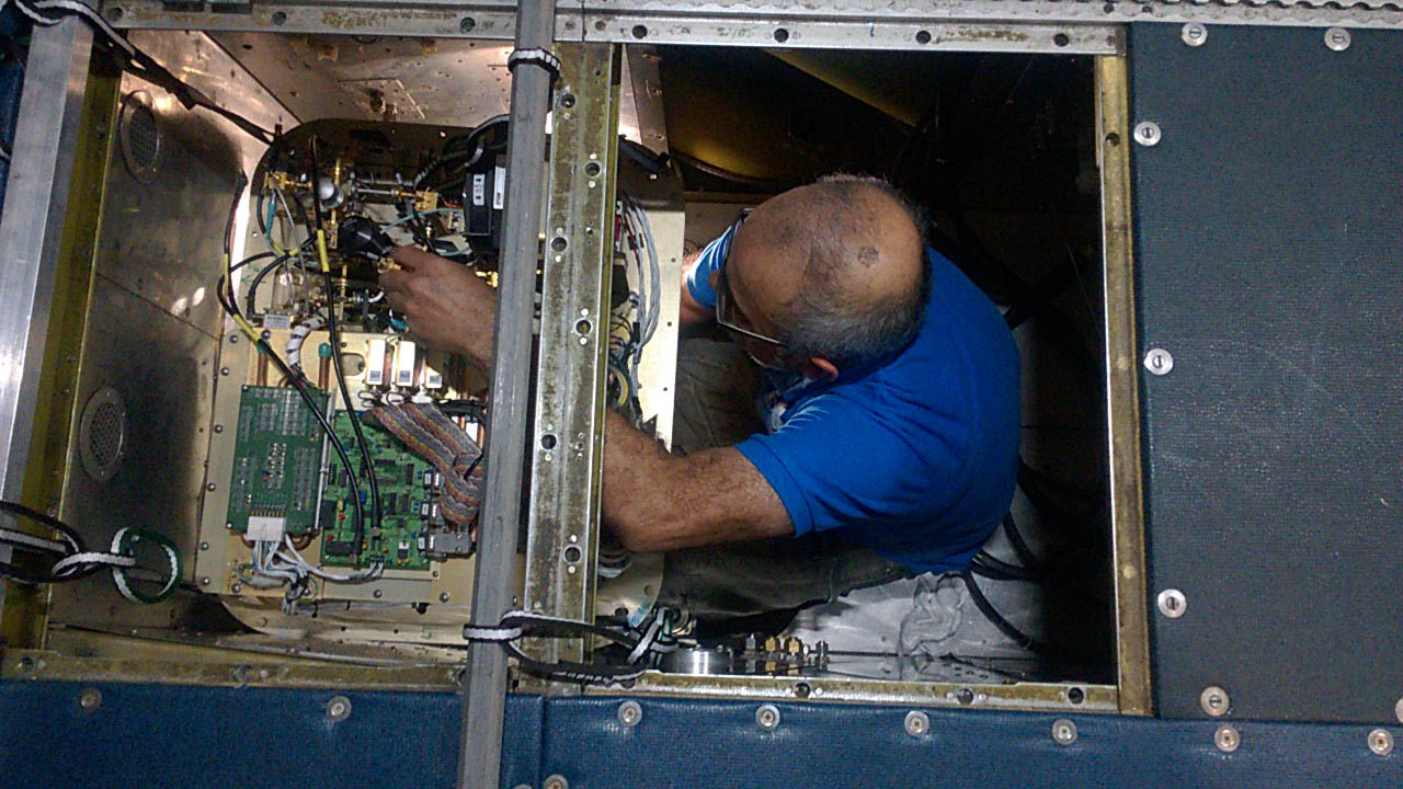 Sergio Pezoa (PSD) installs the W-Band radar on the NOAA P-3 aircraft