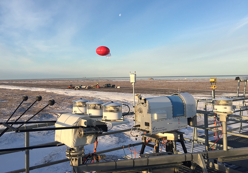 The tethered balloon as it is launched from the runway, during the ERASMUS field campaign in 2016. (Credit: Gijs de Boer, CIRES)