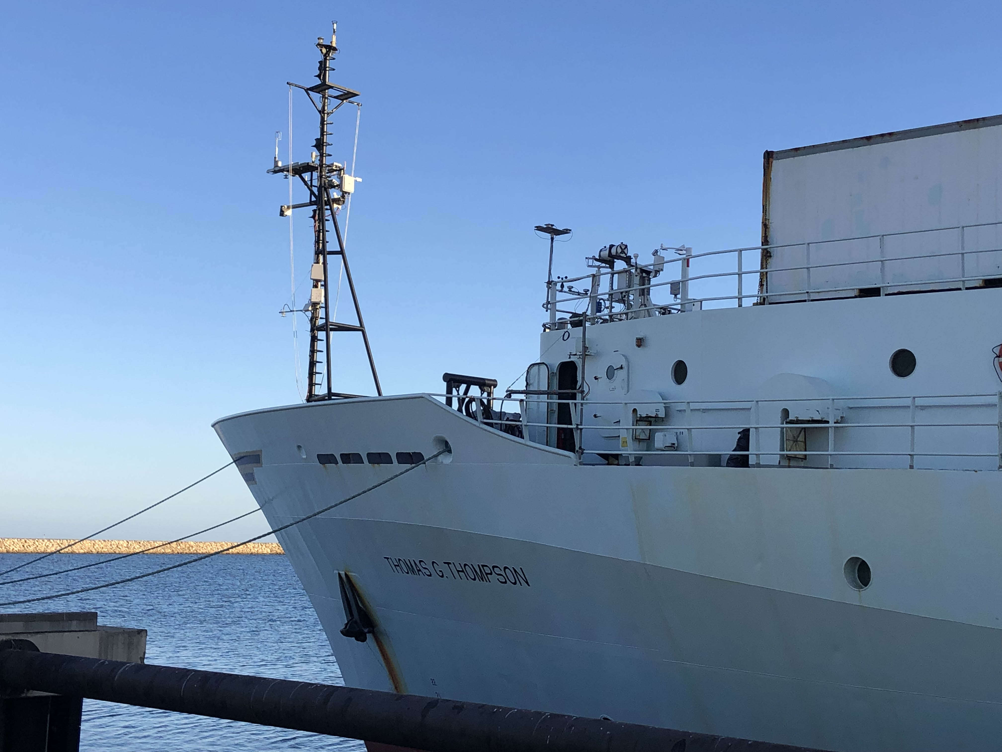 View of PSL's air-sea flux system installed on bow of Research Vessel Thompson from the dock.
